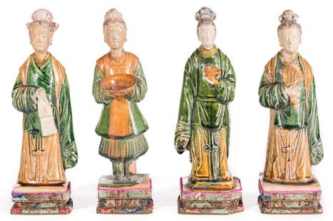 4 Chinese Ming Sancai Tileworks Figures: Group of four (4) Chinese partial glazed Ming Sancai tileworks figures depicting court attendants. Each holding one object in hand and having unglazed heads with traces of old pigment. Fitted with