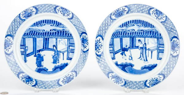 Qing Dynasty Blue & White Porcelain Plates: Pair of Chinese Qing dynasty blue and white porcelain plates, each with interior court scene, peach border and additional landscape decoration to the outer rim. Blue six character K'ang Hsi mark