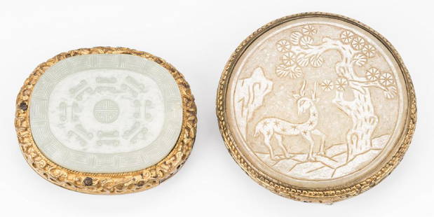 2 Chinese Jade & Gilt Bronze Belt Ornaments: 1st item: Chinese carved pale yellow jade belt ornament, round form with deer and pine tree decoration inset into a gilt bronze base. 2 1/2" dia. 2nd item: Chinese pale celadon jade belt ornament,