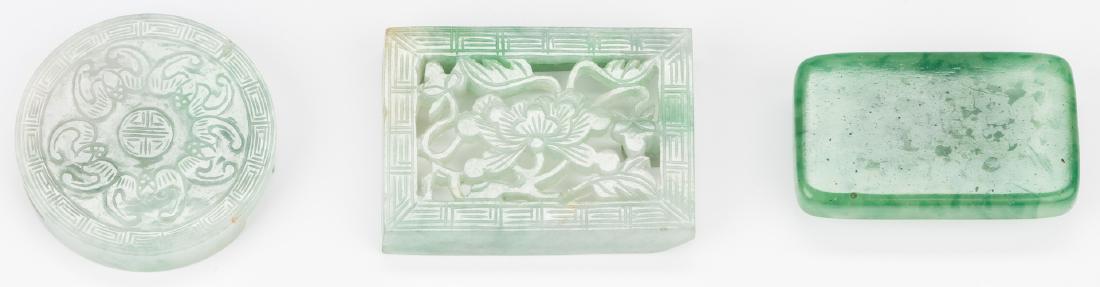 3 Chinese Green Jade Belt Buckles: 1st item: Chinese carved celadon jade belt buckle, rectangular form with pierced carved floral decoration and fretwork border. 1 7/8" H x 2 1/2" W. 2nd item: Chinese carved celadon jade belt buckle,