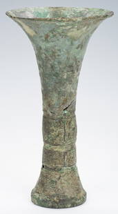 Rare Chinese Archaic Bronze Wine Vessel: Rare and early Chinese archaic bronze ritual wine vessel or Gu, wasted form with flaring rim, trumpet neck, straight sides and a slightly tapering foot. Lower section with three bands of archaic