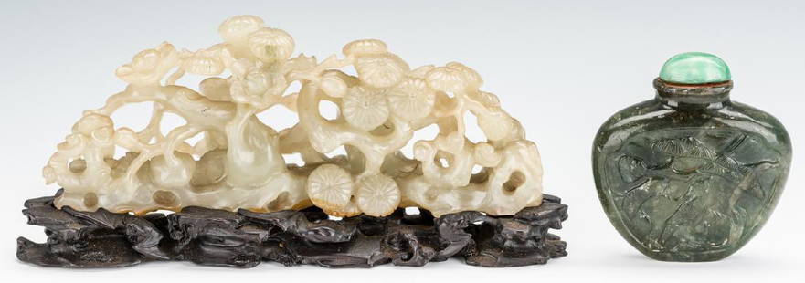 Chinese Carved Jade Boulder and Snuff Bottle: 1st item: Chinese carved and pierced celadon jade boulder in the form of a flowering prunus branch, with a conforming carved hardwood stand. 21 5/8" H x 4 1/4" W. Late 19th/Early 20th century. 2nd