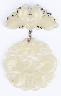 White Jade Brooch: Bee and Butterfly: Chinese two-part white jade brooch, the lower section modeled as a butterfly hovering over two flowers, with the carving on the upper section remniscient of a bee, 3 1/3" x 2 1/8" overall. Early
