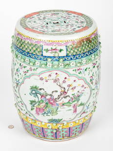 Chinese Famille Rose Porcelain Garden Seat: Chinese Famille Rose porcelain garden seat, barrel form with pierced medallions to the top and sides with an enameled figural landscape vignette to each side and all over enameled foliate decoration.