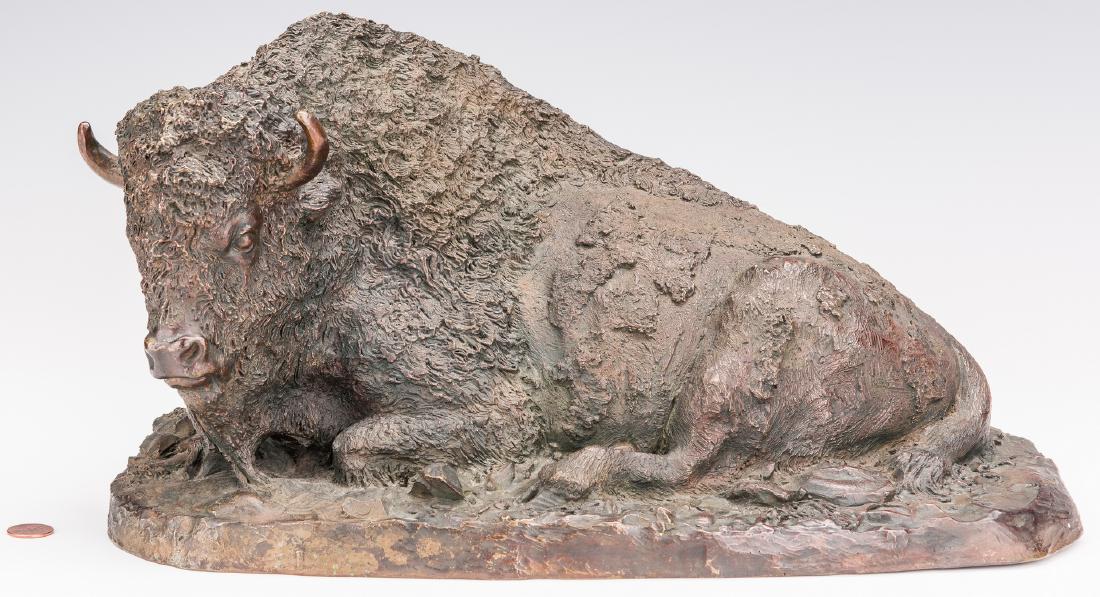 Adam Rose Bronze Buffalo Sculpture: Adam Rose (American, 20th Century) bronze sculpture depicting a reclining buffalo on a naturalistic base. Signed on the base "Adam Rose/Copyright/No. 14". 17" H x 16" W x 11" D. 29 lbs. 20th century. 