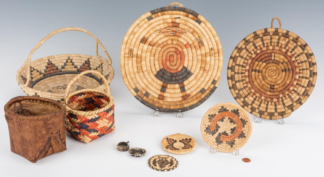 10 Native American Baskets, inc. 5 miniatures: 10 Native American Baskets, including 5 miniatures. 1st item: Choctaw square bottom cane egg basket by Nancy King, original Craftsmen's Guild of Mississippi tag attached. 6 3/4" H x 4 1/2" D x 5" W. 2