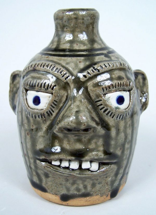 Southern folk pottery face jug by A. G. Meaders