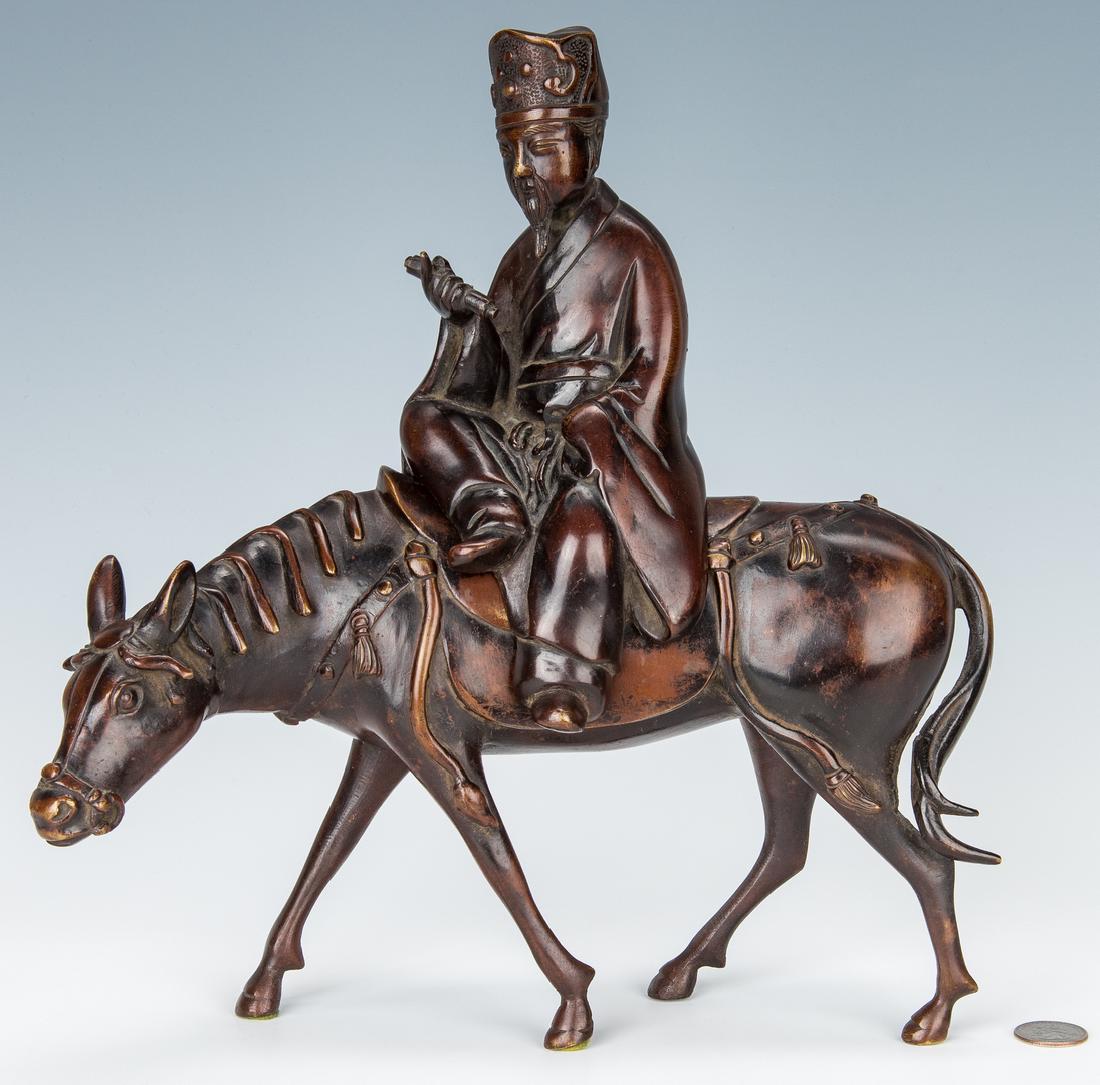 Chinese Bronze Censer, Horse & Scholar: Chinese bronze two-piece incense burner comprised of a horse with scholar atop his back. Horse is modeled standing and fitted with bridle and saddle. The rider is dressed in a robe and decorated hat,