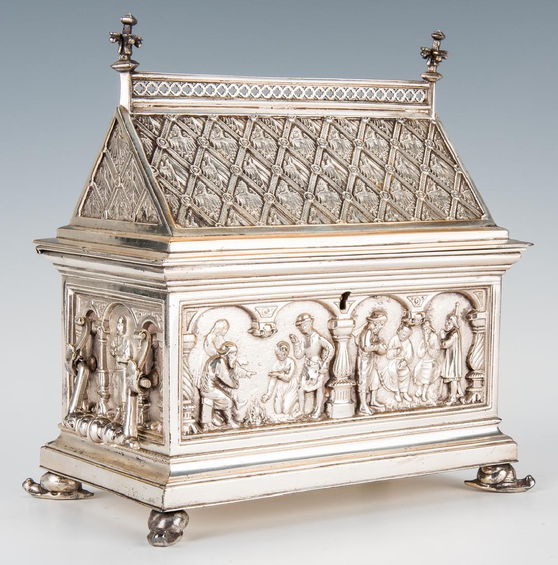 Silver Plated Reliquary or Money Box: Gothic style silver plated reliquary or ecclesiastical alms box, modeled as a church or other architectural structure with pitched roof adorned with pierced quatrefoil band and finials at top and spre