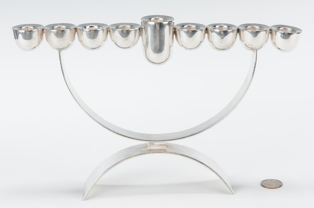Sterling Chanukah Menorah by Bier: Sterling silver Hanukkah candelabra or Menorah hand made by J. Bier of Jerusalem. Designed as horizontal row of nine half ball candle cups, center cup being larger, supported by bows design. Maker's m