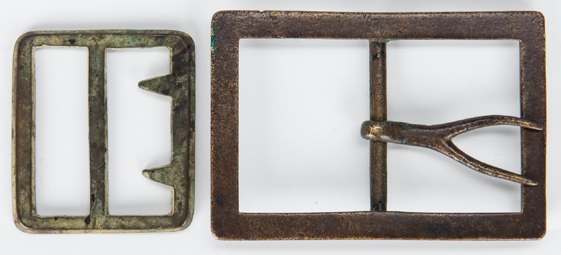 2 Confederate Frame Buckles, incl. Forked Tongue,: Two (2) Confederate frame buckles, including Forked Tongue and Beveled Edge. 1st item: Large "Forked Tongue" sand cast brass frame buckle. 69 mm x 101 mm (2.72" x 3.98"). Note: The buckle was dug in 1