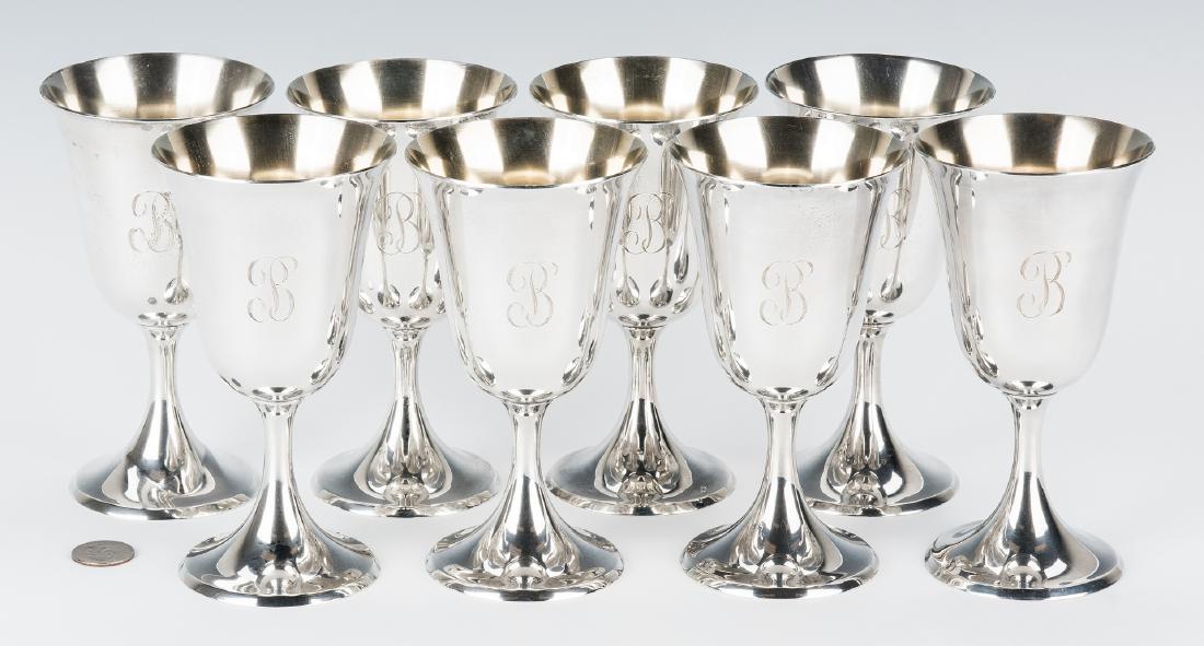 8 Steiff Sterling Silver Water Goblets: Set of eight (8) Steiff sterling silver water goblets, numbered 0801 with Steiff hallmarks on the base. All with script "B" monogram. 6-1/2" H. 45.85 total troy ounces. (Additional high-resolution pho