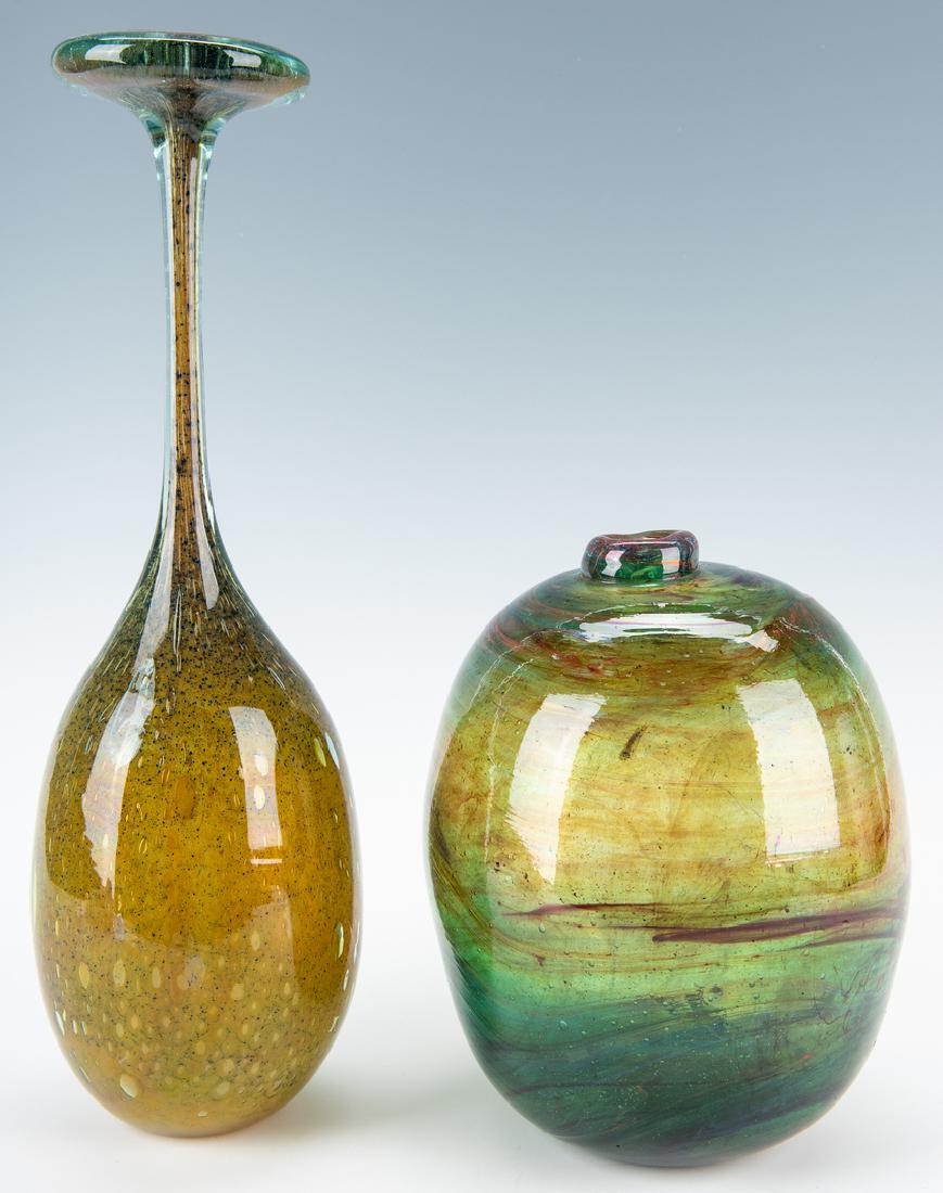 2 Kent Ipsen Art Glass Vases: Two (2) Kent Ipsen (American, 1933-2012) Art Glass vases. 1st item: Tall Art Glass vase, bulbous form with flaring rim and green color with mottled accents, incised signature on the base. 15" H x appr