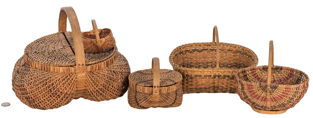 5 Cherokee White Oak Baskets: Assembled grouping of five (5) Native American Cherokee white oak baskets including, two (2) lidded buttocks baskets with handles (9 3/4" H x 11" W x 10 1/4" D and 5" H x 5 3/4" W x 5 1/2" D); one (1)