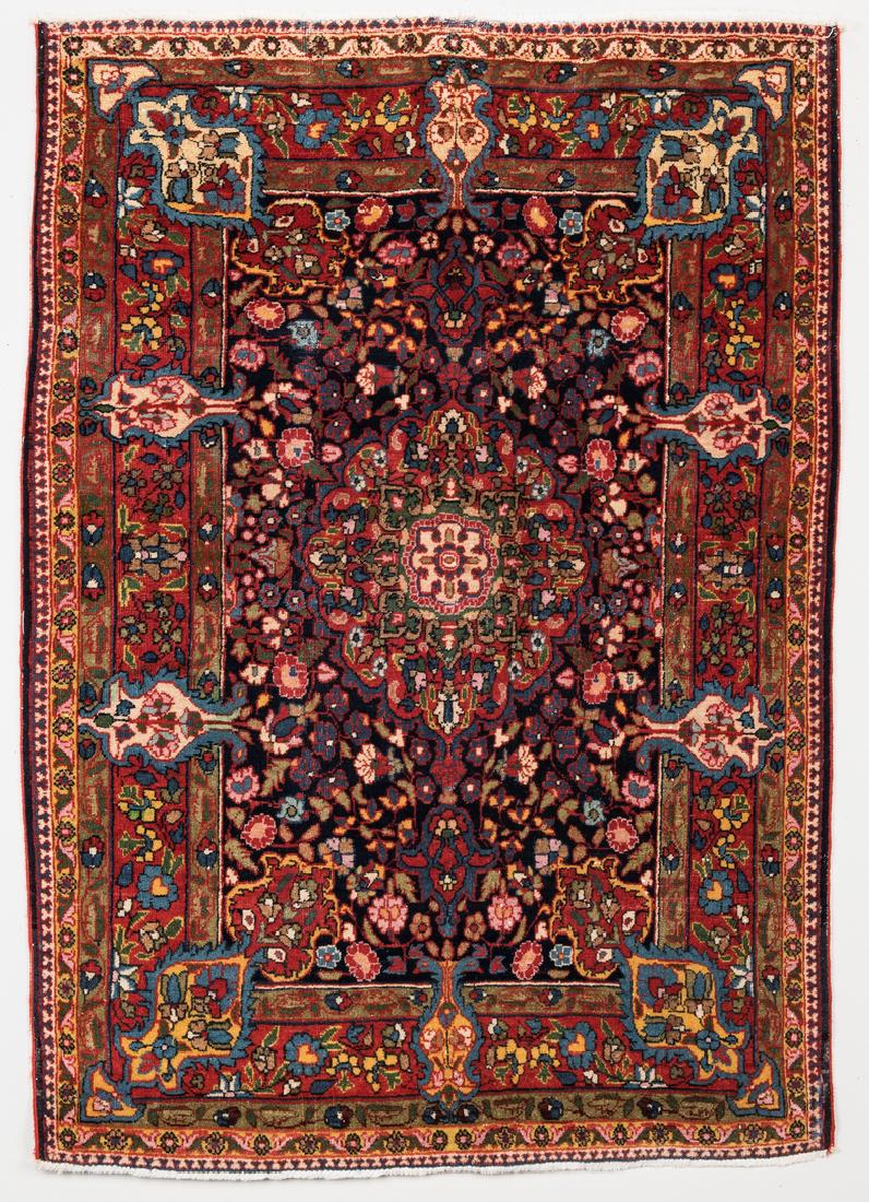 Antique Persian Bidjar 4.7 x 3.3: Antique Persian Bidjar area rug, approximately 4'7 1/2" x 3'3 1/2", wool on cotton, with center medallion of ivory and green, dark blue field with floral pattern, medium blue palmettes, russet primary