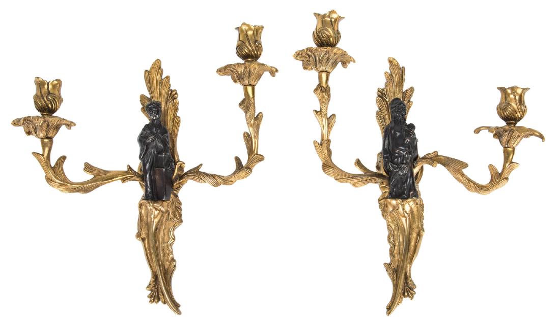Pr. French Bronze Chinoiserie Sconces: Pair of French bronze Chippendale style Chinoiserie double-arm wall sconces, each with central patinated bronze Chinese figure. Marked en verso of figure, "Made in France". 14 1/4" x 11 1/2" x 4 1/2" 