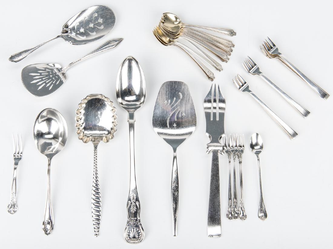 32 Pcs. Assorted Sterling Silver Flatware: Assembled grouping of 32 sterling silver flatware pieces including 10 Whiting ice cream forks with gilt wash interiors, 9 International cocktail forks, 4 Gorham cocktail forks, 1 Gorham lemon fork, 1 