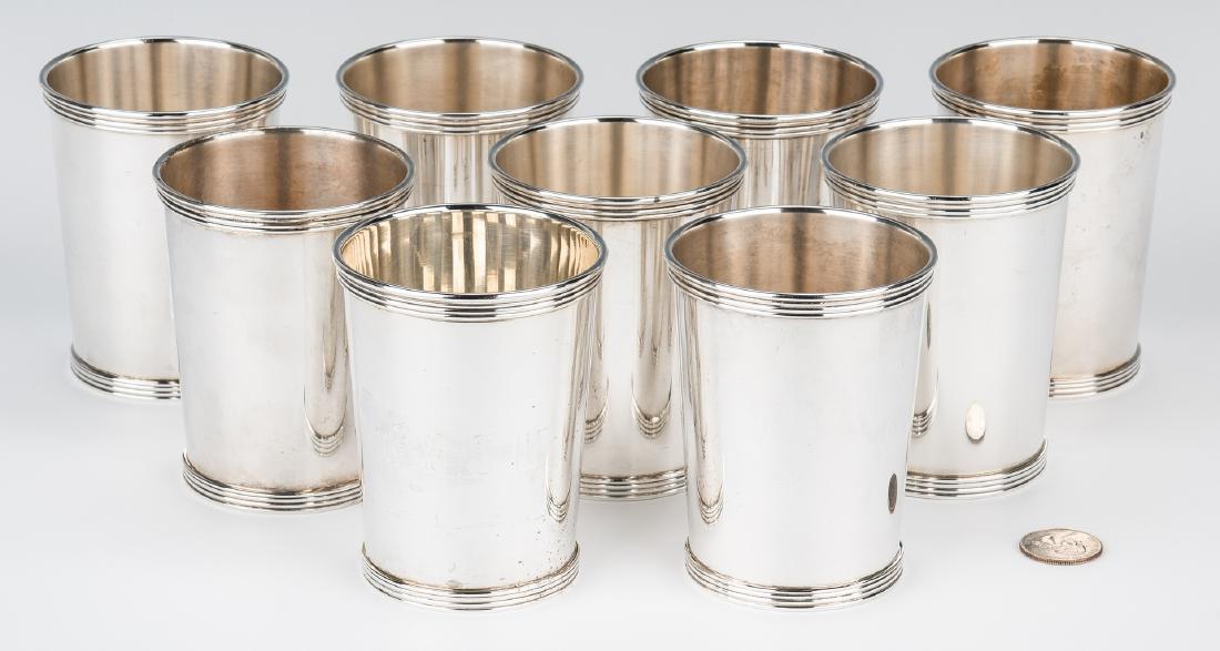 9 International Sterling Mint Julep Cups: Set of nine (9) International Company sterling silver julep cups, pattern #P669. 3 3/4" H. 35.99 total troy ounces. (Additional high-resolution photos are available at www.caseantiques.com.)
