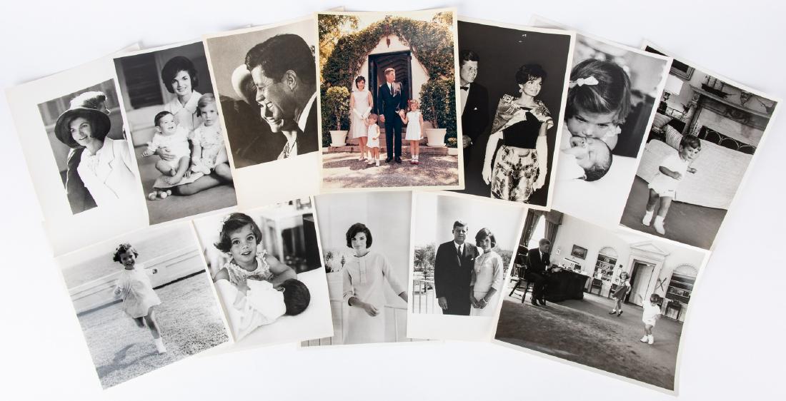 20 JFK Family Photographs, incl. C. Stoughton: Twenty (20) John F. Kennedy administration era photographs, including Cecil W. Stoughton. 1st item: One (1) photograph depicting President John. F. Kennedy watching his children Caroline Bouvier Kenne