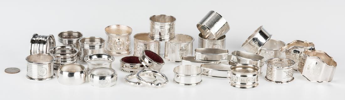 Assembled Group 31 Napkin Rings, most Sterling: Collection of 31 napkin rings of various designs from several makers and countries of origin. Group includes 11 British sterling: 5.745 oz troy; 7 American sterling: 3.510 oz troy; 2 Egyptian silver: