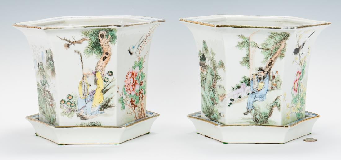 Pair of Chinese Republic Jardinieres: Pair of Chinese Republic period porcelain jardinieres and underplates, hexagonal form with flaring tims, blue overglaze decoration and edge gilding to rims of both jardinieres and underplates; the sid