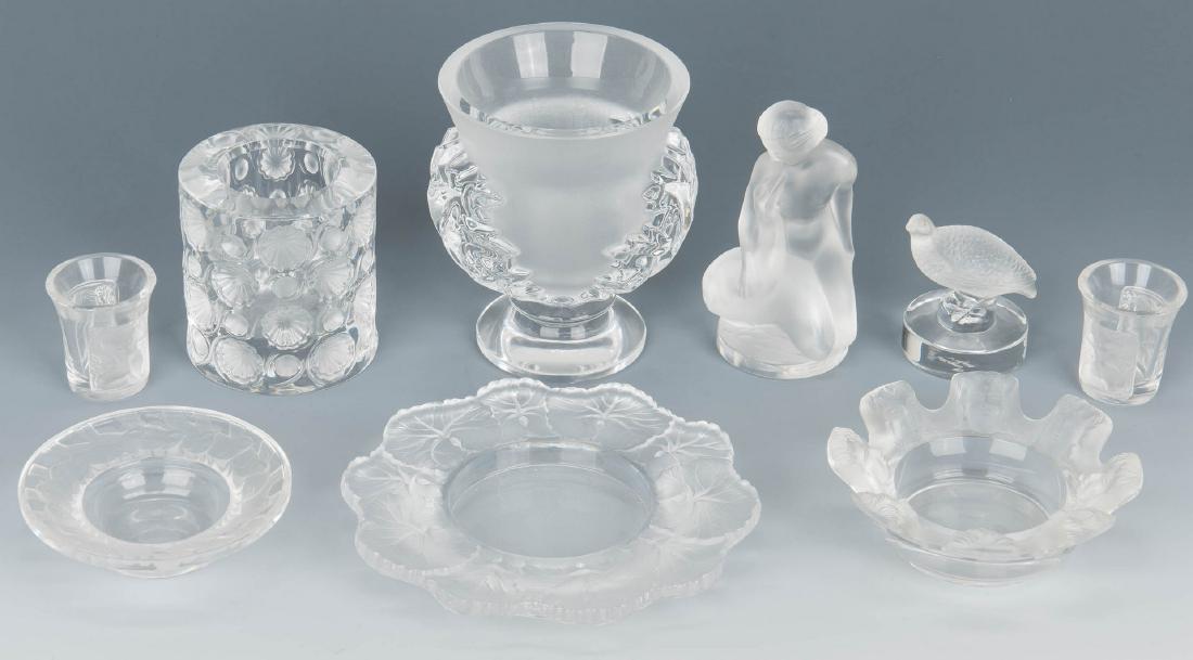 9 Assorted Lalique Novelty Crystal Items: Nine (9) Assorted Lalique novelty crystal items including a pair of "Les Enfants" shot glasses, each with two frosted panels of decoration, a figural quail on a round pedestal base, a round pin dish w