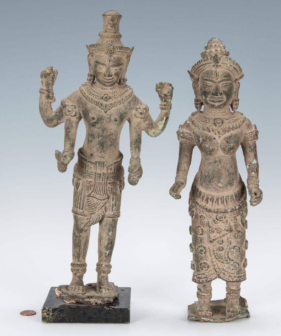 2 Tibetan Bronze Deity Sculptures: Pair of bronze Tibetan deity altar sculptures, one depicting a standing male figure with four arms and holding an object in each hand and the other depicting a standing female goddess, both with squar