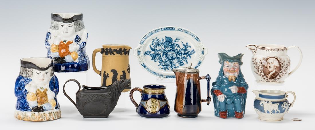 10 Assorted English Ceramic Items, incl. Wedgwood: Assembled grouping of English ceramic items, ten (10) total, including three (3) Toby Jugs, three (3) Wedgwood cream pitchers, one (1) Wedgwood figural basalt cream pitcher, one (1) blue and white sma