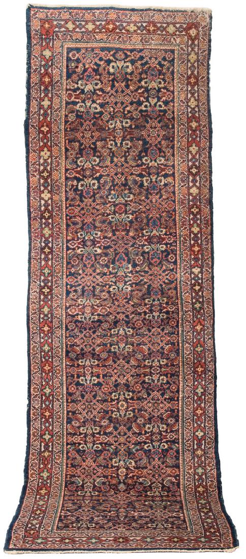 Persian Hamadan runner, 11'3" x 3'6": Persian Hamadan runner, 135" x 43 1/2", wool on cotton, dark blue field, allover design, three main borders, secondary colors of rust, salmon, yellow, blues, ivory, and green. 1st quarter 20th century