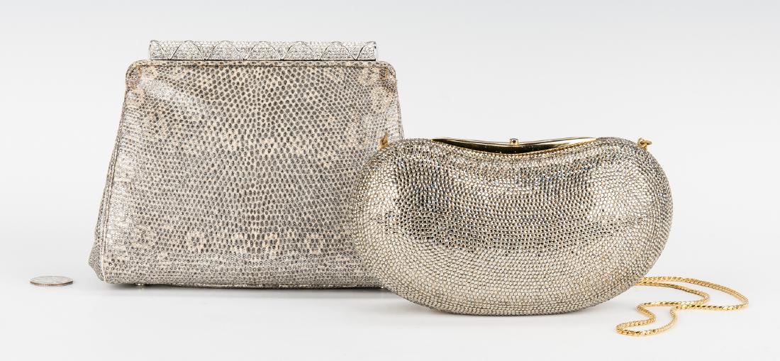 2 Judith Leiber Bags: Two (2) Judith Leiber Bags. 1st item: Crystal Minaudiere clutch with gold chain strap, gold lame interior. 7 1/4" W x 3 3/4" H. 2nd item: Snake skin pattern evening bag with one silver and one gold in