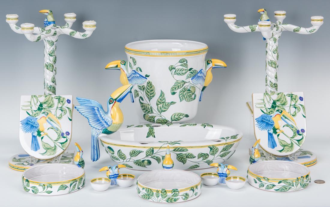 13 Hermes Moustiers Faience Toucans Pattern Porcelain: Thirteen (13) Hermes Moustiers Faience Toucans Pattern porcelain items, including two (2) 4 light candelabra, three (3) wine coasters, two (2) double salt cellars, four (4) coaster tiles, one (1) cham
