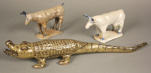 Charles Moore folk pottery animals: North Carolina folk pottery grouping by Charles Moore (1935-2007). 1st item - green glazed alligator, marked on underside, "Charles Moore Jugtown Ware 1999". 17 1/2" length. 2nd item - stoneware deer