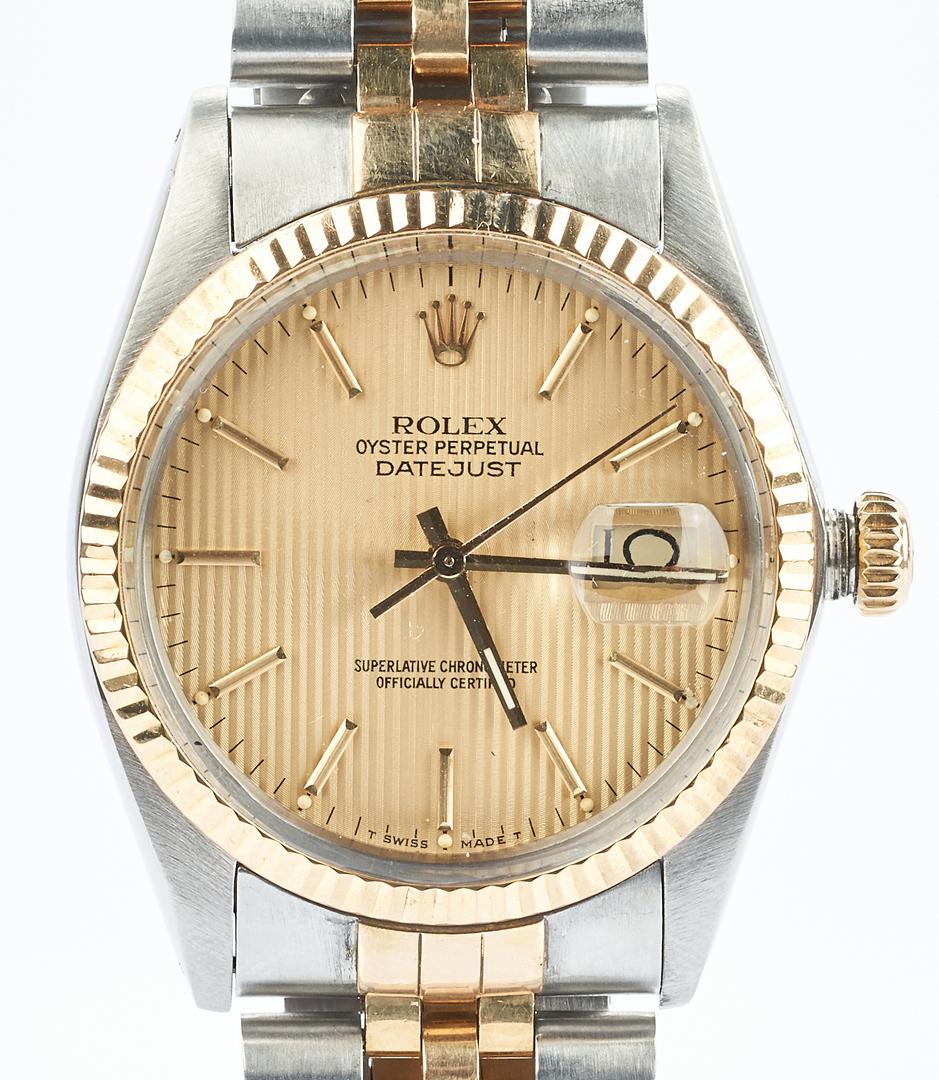 Mens Rolex Oyster Perpetual Datejust Wristwatch: Men's Rolex Oyster Perpetual Datejust Jubilee watch, stainless and gold band, two tone champagne pin-striped dial with baton hour markers and hands, manual movement, calendar date aperture at three, s