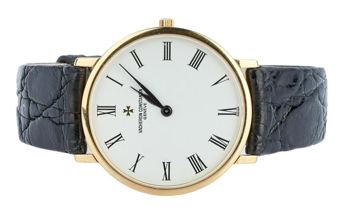 18K Men's Vacheron Constantin Geneve Watch: 18K Men's Vacheron Constantin Patrimony Superflat watch, round yellow gold ultra flat case surrounding a white 33mm dial with Roman numeral hour markers with the original black crocodile leather strap