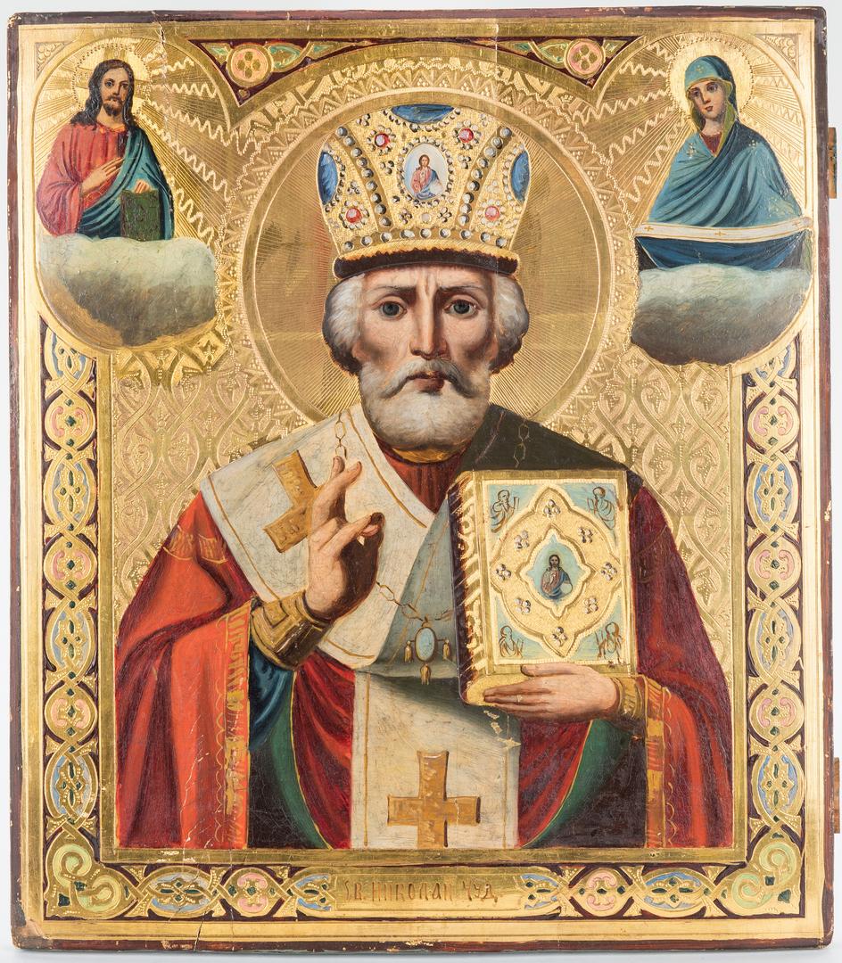 Russian Icon of St. Nicholas: Russian icon, polychrome tempera and gilt on a cradled wood panel depicting St. Nicholas (the Wonder Worker) to the center holding a book of scripture flanked by the Virgin Mary and Christ upper corne