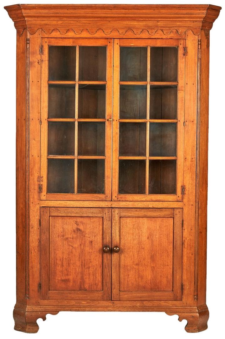 Early East TN Corner Cupboard, Moses Crawford: Early Knox County, Tennessee walnut corner cupboard attributed to Tennessee's earliest cabinetmaker, Moses Crawford (Knox County, 1743-1819). One piece cupboard form with a stepped, five-part cornice 