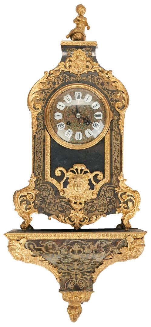 Louis XV Style Raingo Freres, Paris Bracket Clock: Louis XV Style Raingo Freres, Paris ebonized wood and ormolu bracket clock with brass Boulle style marquetry overlay. Clock face with enameled Roman numerals inset into a brass repousse frame, enclose