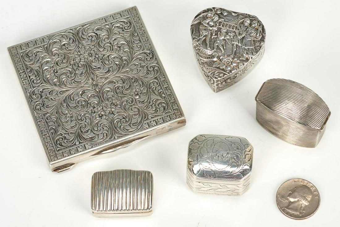 5 Silver Boxes incl. Vinaigrettes: Five (5) small silver vertu boxes. 1st item: George III sterling silver vinaigrette, rectangular form with cut corners, slightly domed hinged lid and bright cut foliate decoration, hallmarks for Londo