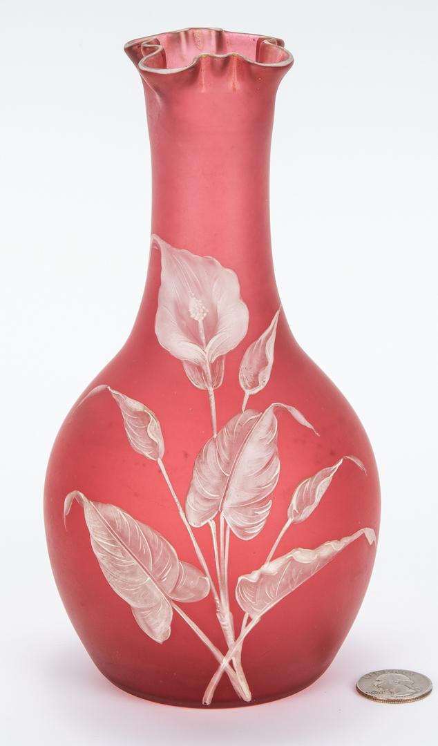 Webb Cameo Glass Vase, attrib. Thomas Webb: Webb Star Cameo glass vase, deep rose pink with white lily and butterfly decoration to the body and ruffled rim with white trim. Pencil inscription to base reading "#846/Star Cameo/ DET". 8" H. Englis