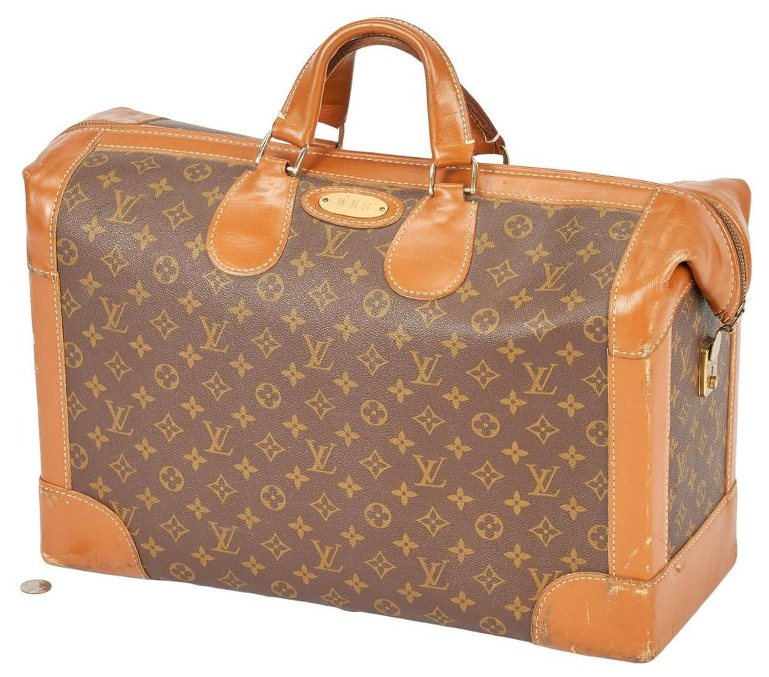 Louis Vuitton Shoe Bag: Louis Vuitton brown and tan shoe bag with zipper closure, brown corduroy lining and eight interior shoe pockets. Monogrammed plaque "WKS". Key not available for lock. 12.5" H x 18.75" W x 7.75" D. Las