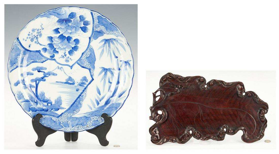 Meiji Hardwood Tray and Large Porcelain Charger: Two (2) Japanese decorative items, including hardwood tray, porcelain charger. 1st item: Hardwood tray, carved in a naturalistic leaf form with scrolled sides and incised veining. 1" H x 18" W x 11" D