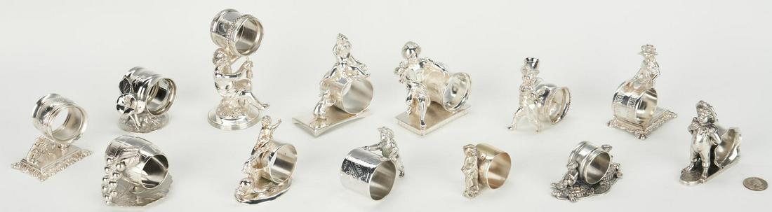13 Silverplated Napkin Rings incl. Figural Children: Thirteen (13) silverplated napkin rings, most with figural decoration, including Kate Greenaway children figures and cherubs. Includes 2 Reed and Barton cherub figures (#1285, 1194), 2 cherub figures