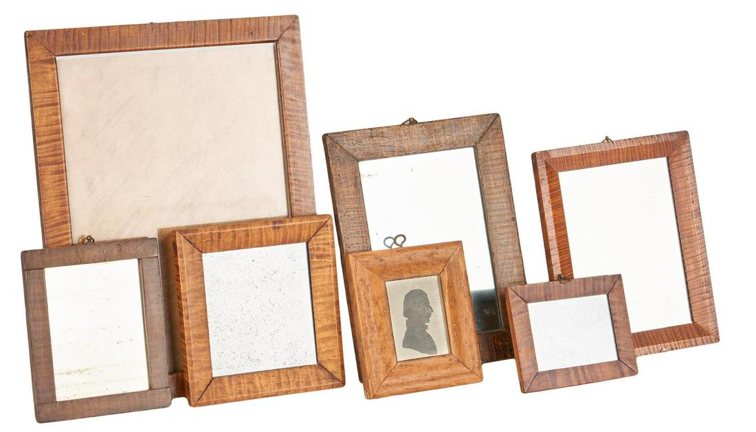Group 7 Framed Items, incl. Tiger Maple: Group of seven (7) items housed in tiger maple, tiger maple veneer or faux painted tiger maple frames; including five (5) mirrors, one (1) primitive painted silhouette portrait of a male and one (1) e
