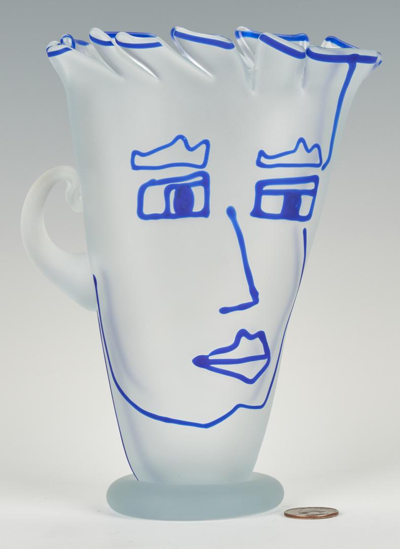 Richard Jolley Art Glass Vase or Pitcher w/ Face: Richard Jolley (American, born 1952) frosted art glass vase with handle or pitcher form with "pinch folded" rim and blue overlay profile face decoration with handle representing the ear. Signed and da