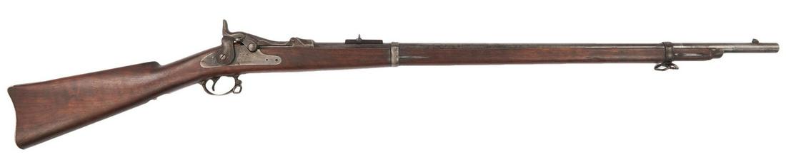 U.S. Model 1884 Springfield Rifle, .45-70 cal.: Model 1884 "Trapdoor" Springfield rifle, .45-70 caliber, serial # 479877. Lock plate marked "U.S. Springfield" with eagle logo, breech marked "US Model 1884", butt plate marked "US". Barrel marked "VP