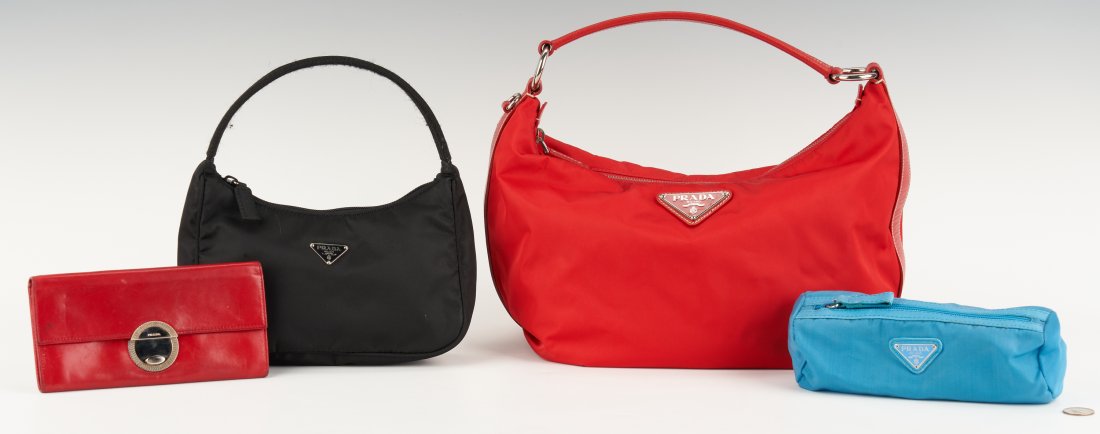 4 Prada Items, incl. 2 Tessuto Hobo Bags: Four (4) Prada items, including two (2) Tessuto Hobo bags, one (1) wallet, and one (1) makeup bag. 1st item: Tessuto Hobo red nylon satchel bag with red leather top handle and trim, silver tone hardwa