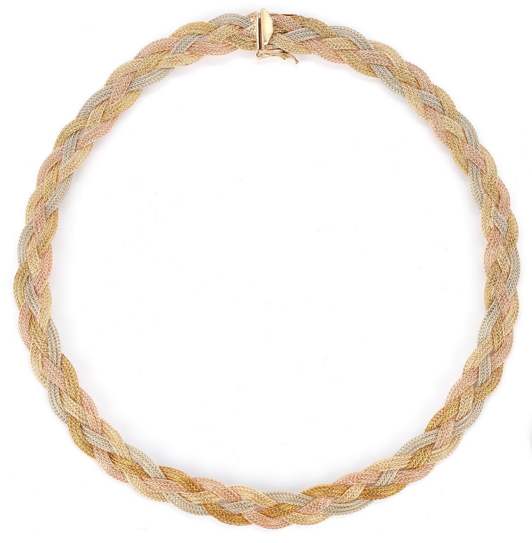Ladies 14K Tri-Gold Braided Necklace: One ladies 14k tri-gold braided necklace, 10.0mm in width, and weighing 22.2 grams. Marked "14K" and "PAT. 3308517". 15" L. Provenance: The Estate of Kathleen Preston, Chattanooga, TN.