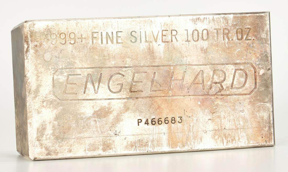 Engelhard Silver Ingot, 100 Troy Ounces: Engelhard .999 Fine Silver Bullion Bar, Serial # P46683. 1 1/8" H x 6" W x 3 1/8" D. 100 troy ounces. Provenance: Estate of Anne Harrison Taylor & Joseph F. Taylor, Morristown, TN.