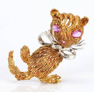 Ladies 18K Gold Sapphire & Diamond Pin: Ladies 18K yellow and white gold sitting cat pin with a bow featuring 3 single cut diamonds approximately 0.03 carats, Clarity-VS2, Color-G and 3 natural pink sapphires, 1 round and 2 pear shaped, as