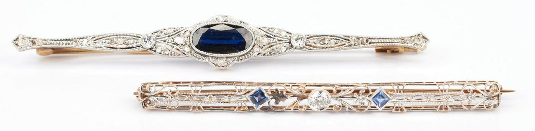 2 Ladies Gold, Diamond, and Gemstone Brooches: 1st item: Ladies 18K yellow gold brooch featuring 1 oval brilliant natural sapphire approximately 10.4 x 5.3mm, heat treated, accented by 2 round brilliant and 30 rose cut diamonds approximately 0.20